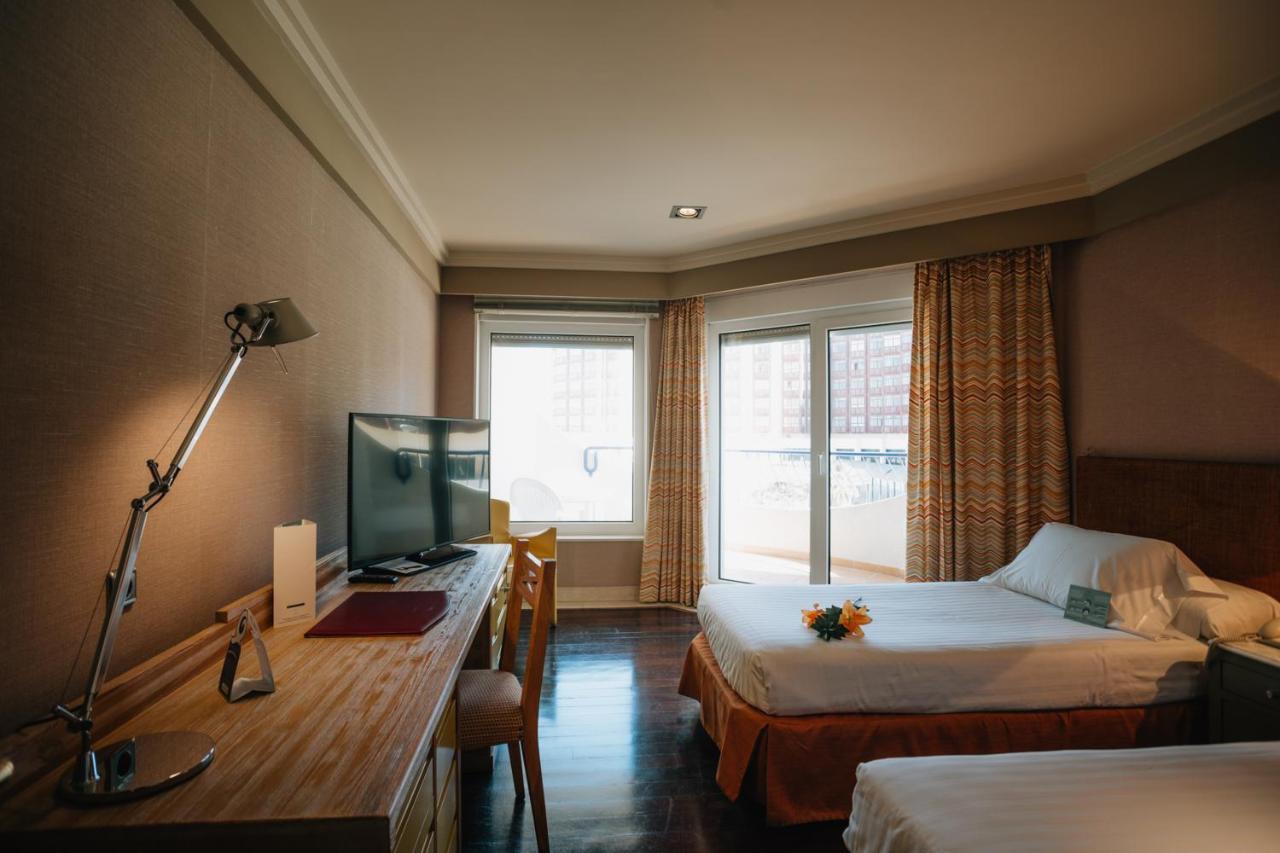 Classic Double or Twin Room with Side Sea View and Extra Bed