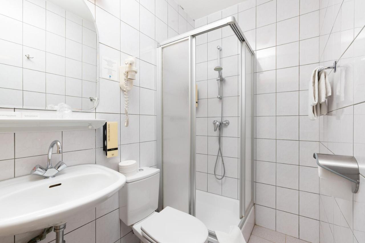 Kleine Tweepersoonskamer met 2 Aparte Bedden