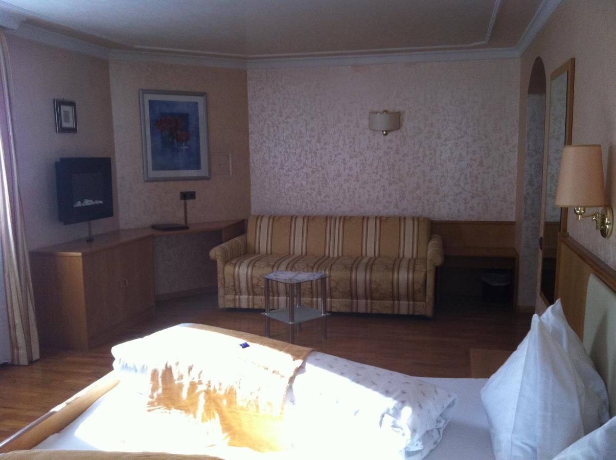 Dreibettzimmer mit Balkon