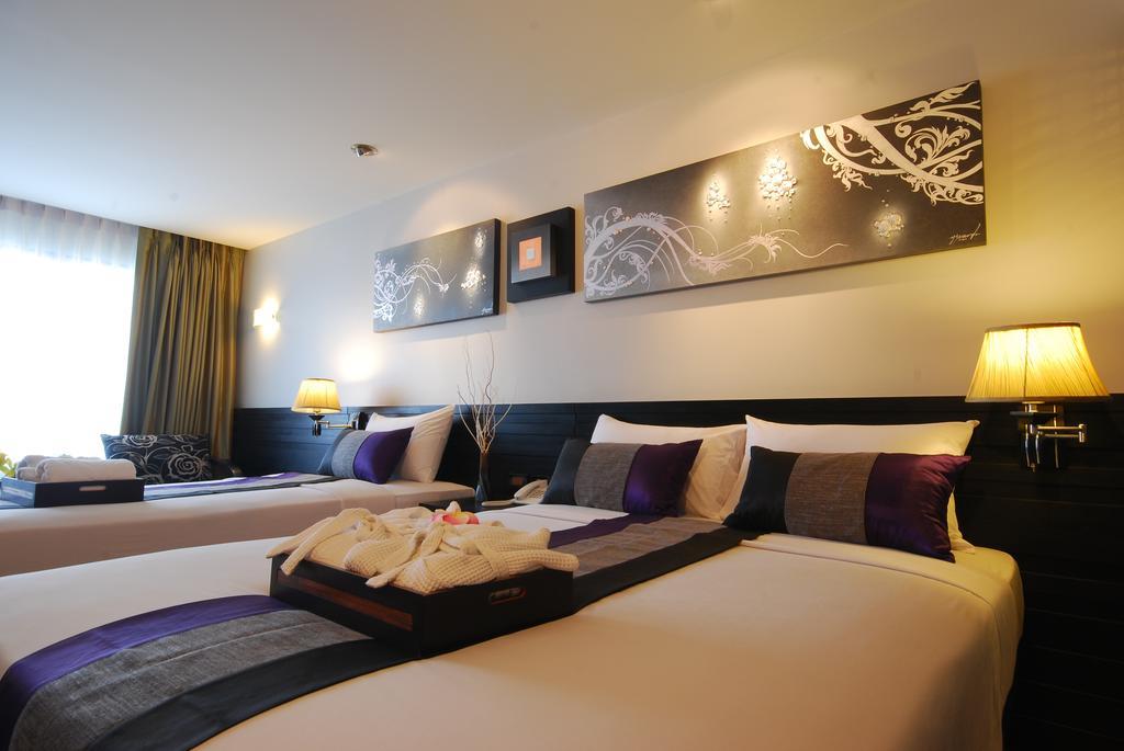 Grand Deluxe Dreibettzimmer