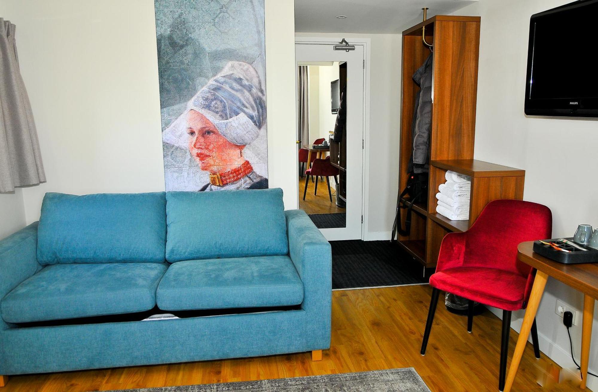Suite met 2 Eenpersoonsbedden en Slaapbank
