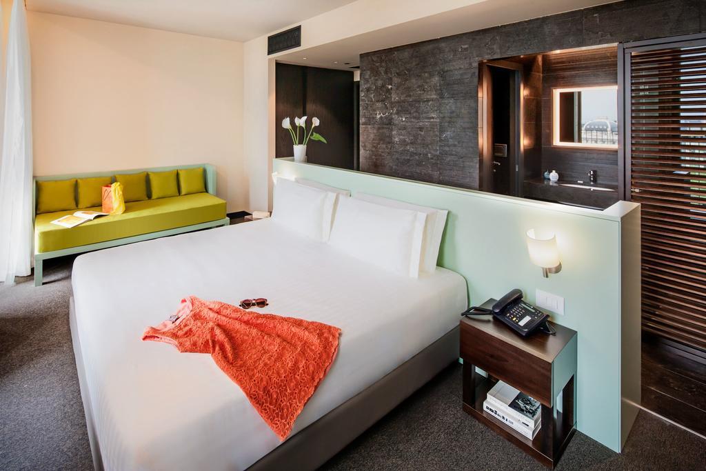 Deluxe Triple Room with Balcony and View
