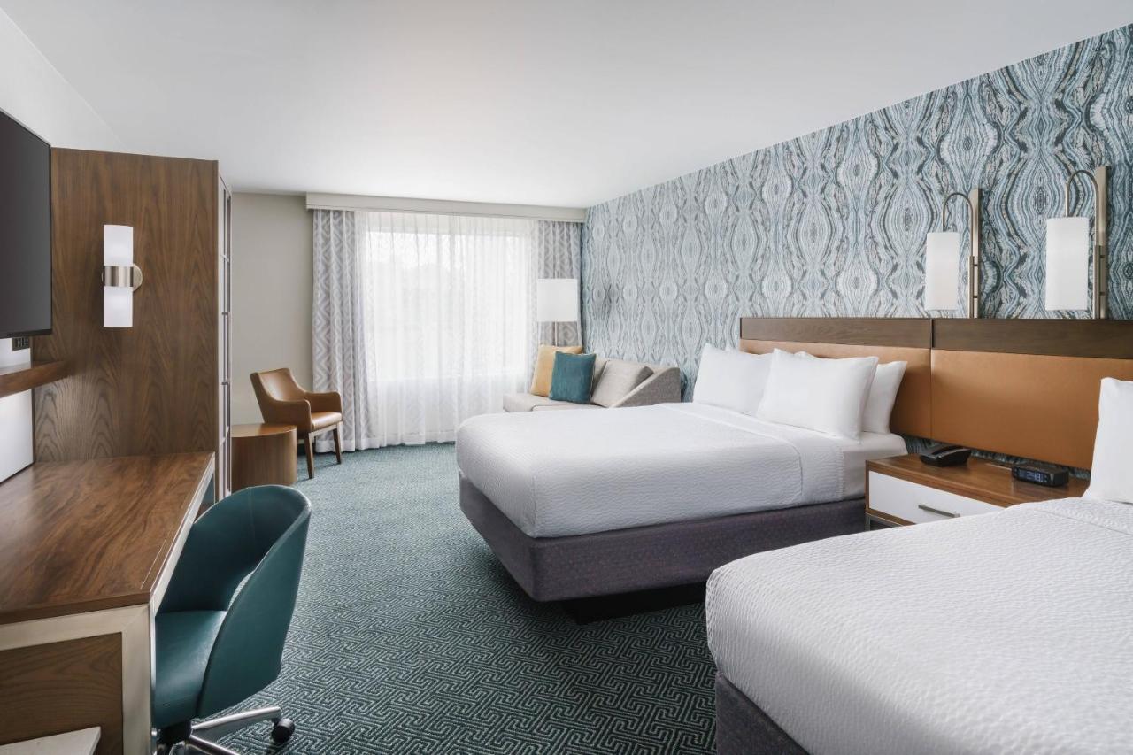 Queen Room with Two Queen Beds and Courtyard Access