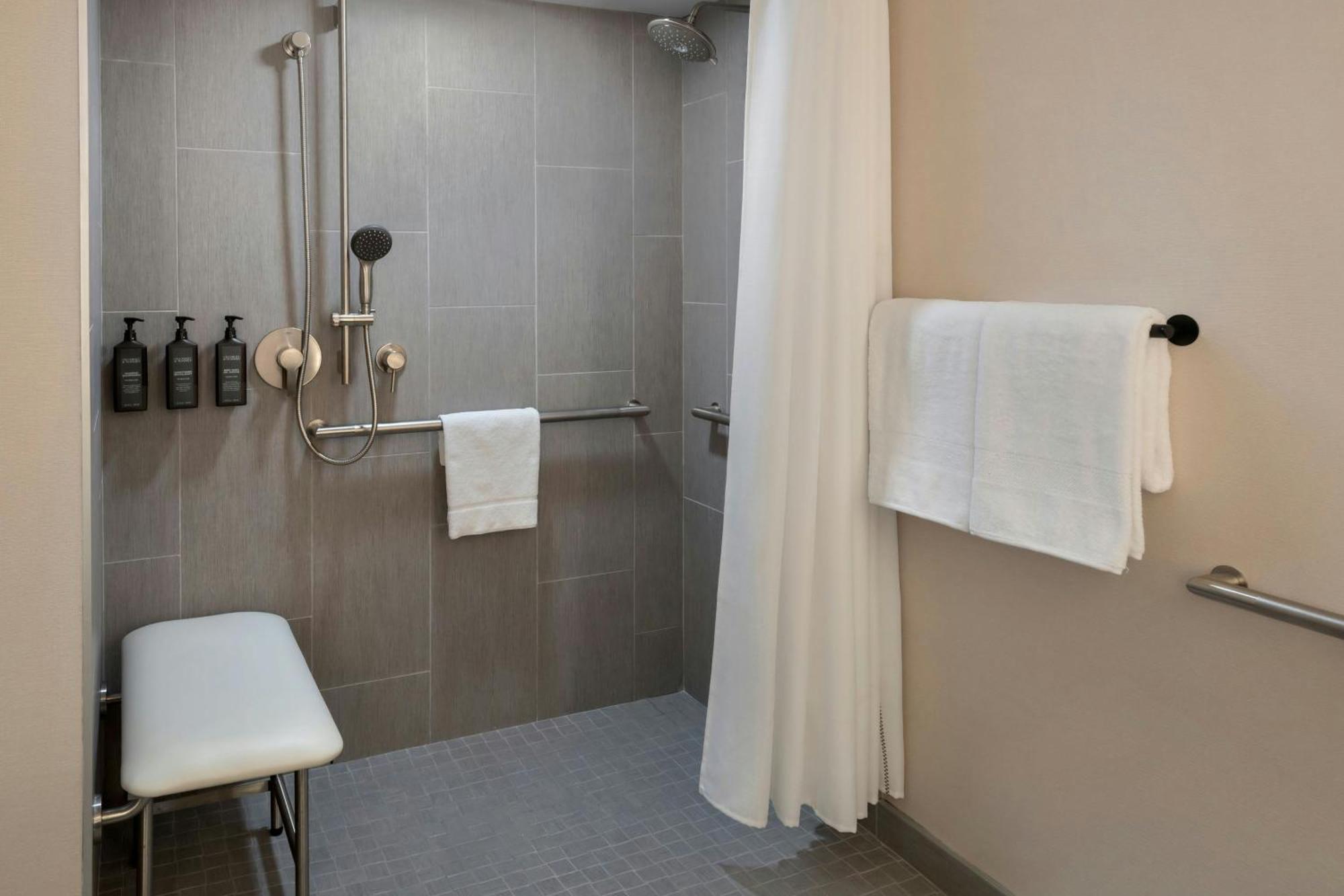 Traditional Queen Room Roll Shower Mobility Hearing Accessible