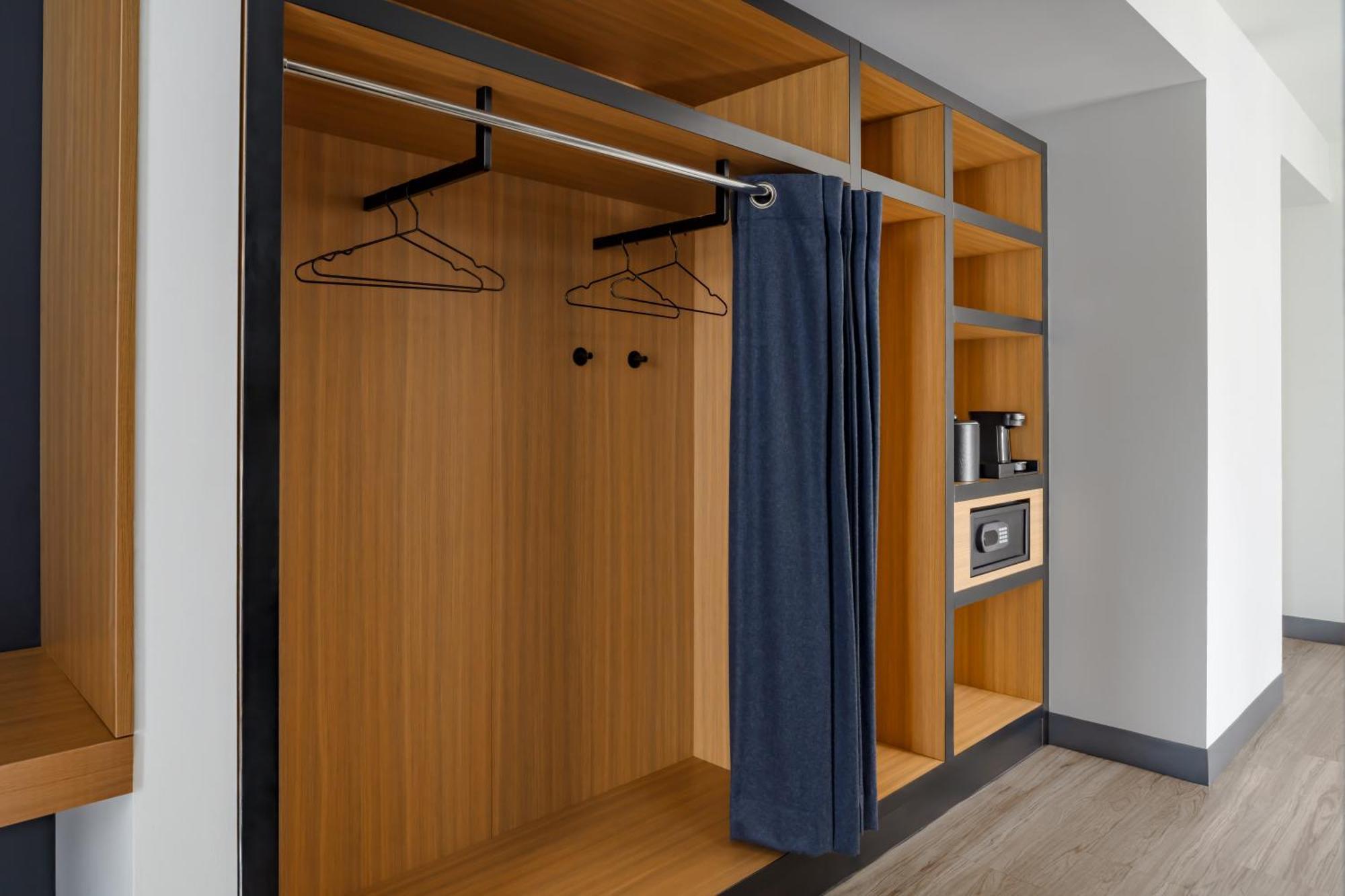 Queen Suite with City View and Balcony - Mobility Accessible with Roll-In Shower
