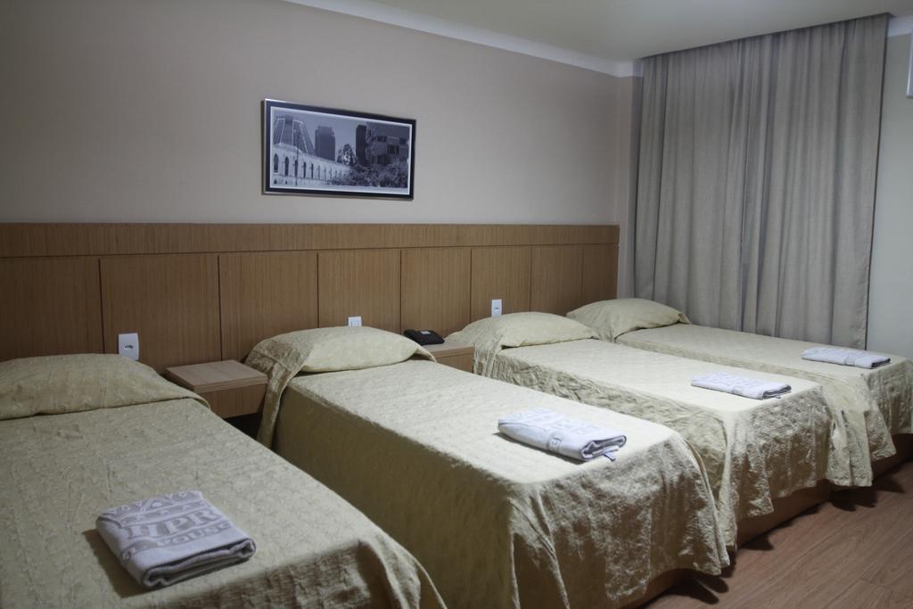 Quarto Deluxe Quádruplo