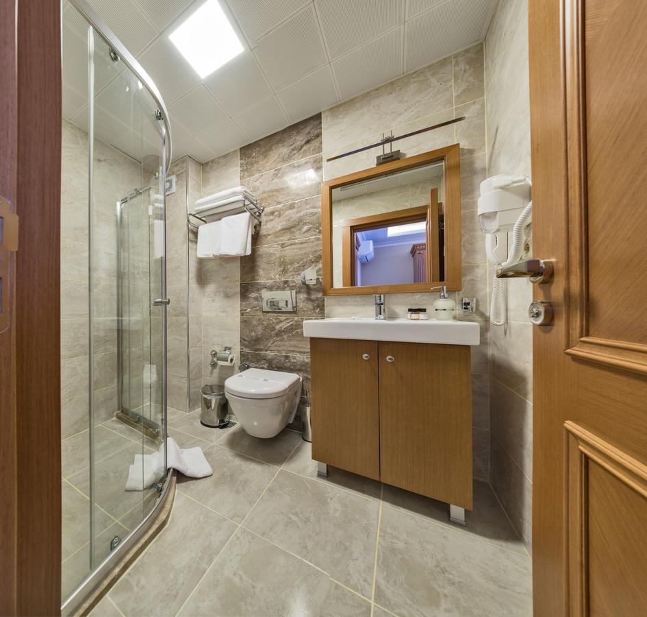 Deluxe tweepersoonskamer met balkon en uitzicht op zee