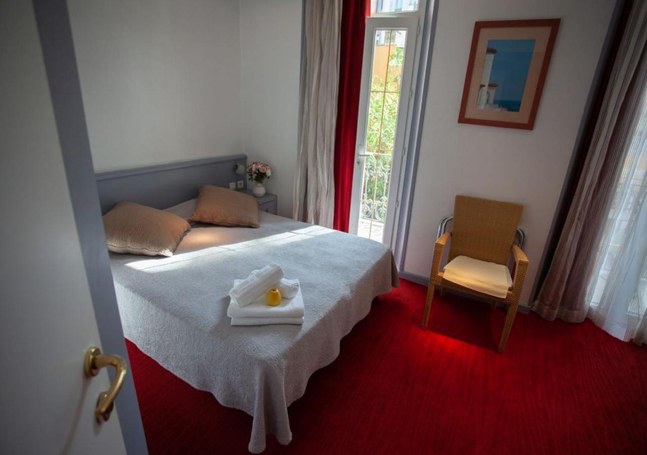 Tweepersoonskamer met 1 of 2 bedden en balkon