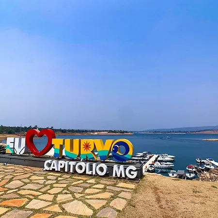 Pousada com vista para lago e com passeios de lancha em frente a Pousada em Capitólio, perto dos principais atrativos turístico, Pousada Vista do Turvo, Mandala-2